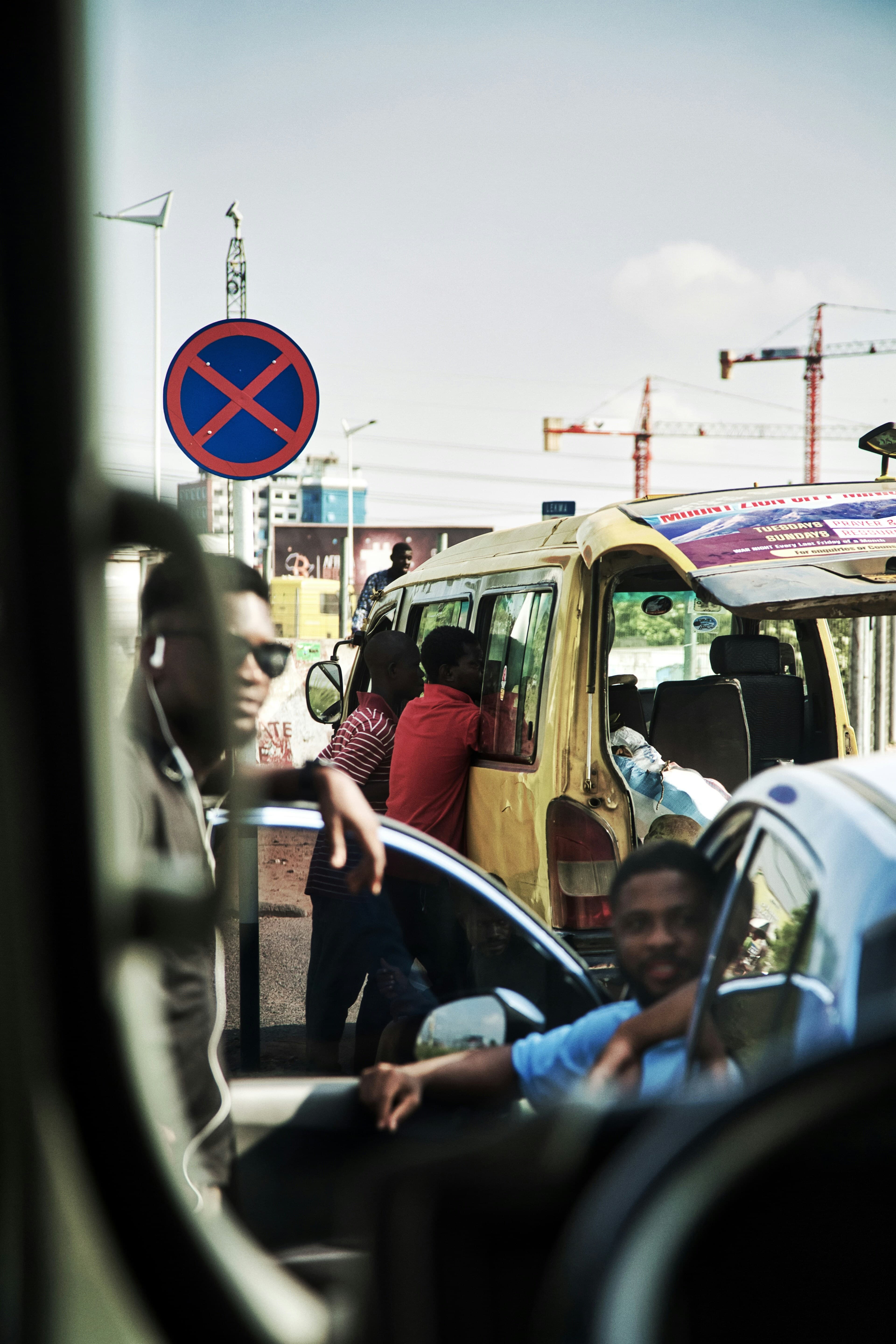 A busy taxi and minibus rank in Ghana
